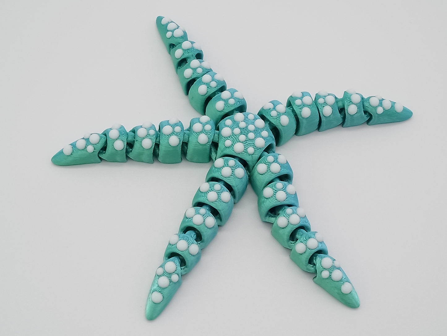 Tiny Articulated Starfish – 7" Fidget Sea Creature
