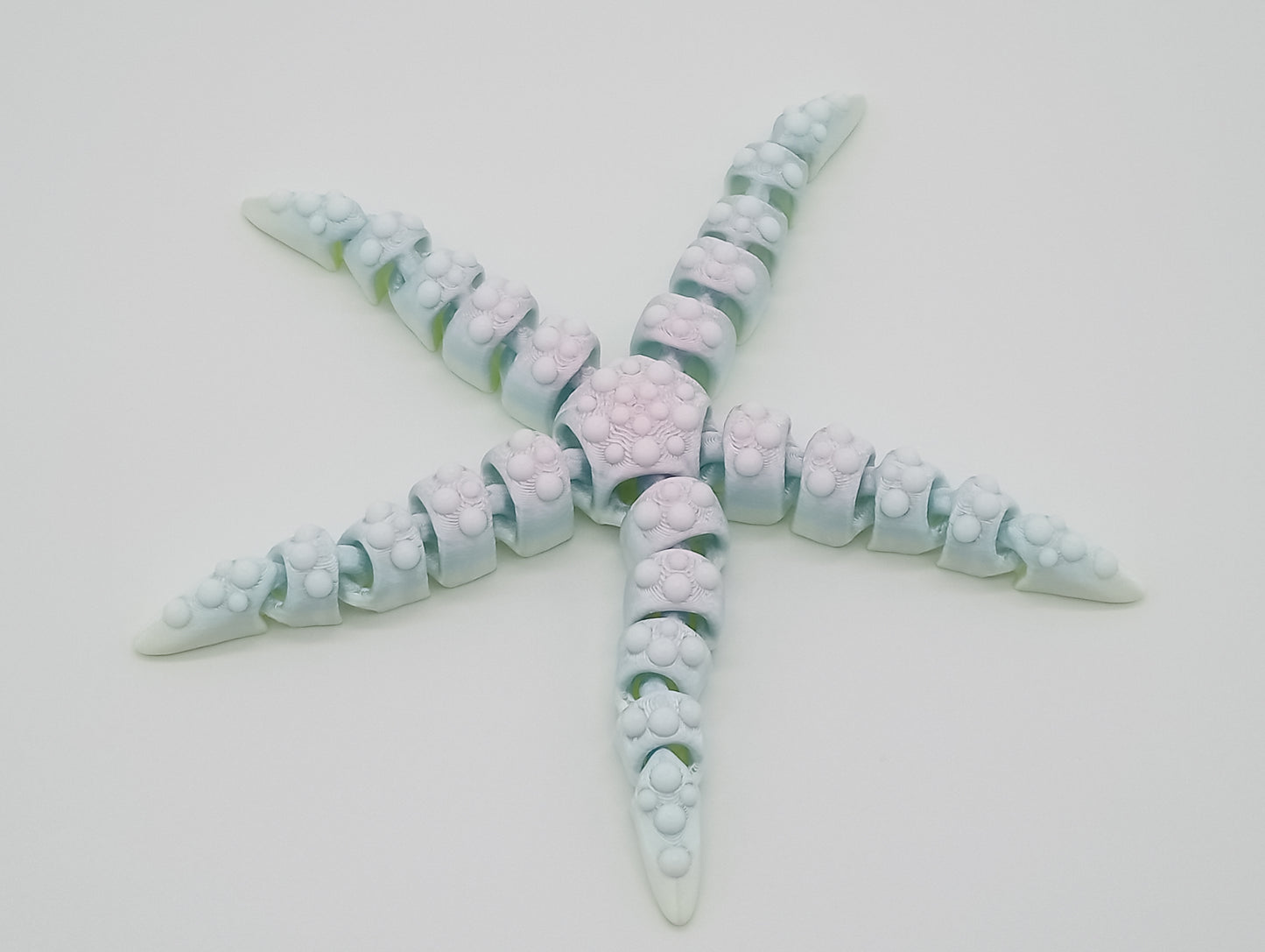 Tiny Articulated Starfish – 7" Fidget Sea Creature