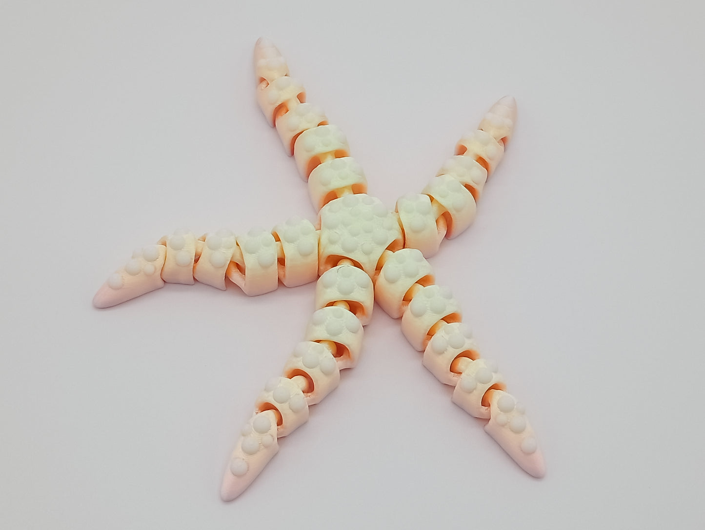 Tiny Articulated Starfish – 7" Fidget Sea Creature